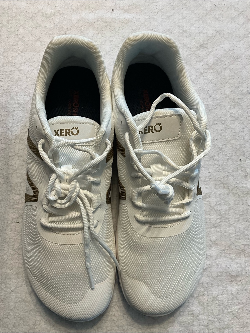 Xero White Athletic Sneakers with Gold Accents - Lightweight Men's Trainer